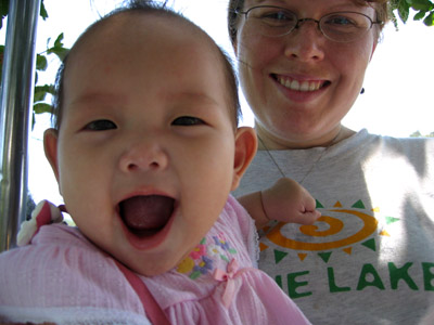Swinging & smiling with Mom